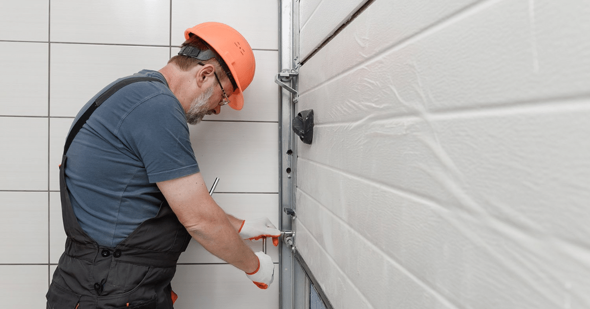 expert repairing a garage door
